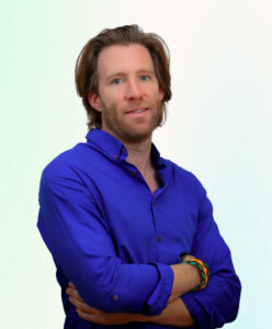 Vincenzo Villamens, CPA – Founder and CEO at Entity Inc., man with sandy hair and blue eyes smiling at camera with crossed arms.