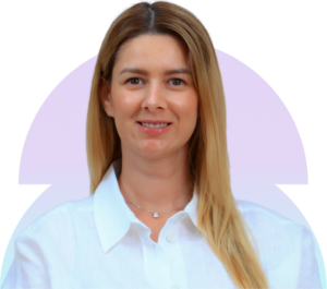 Smiling female incorporation specialist with long blonde hair.